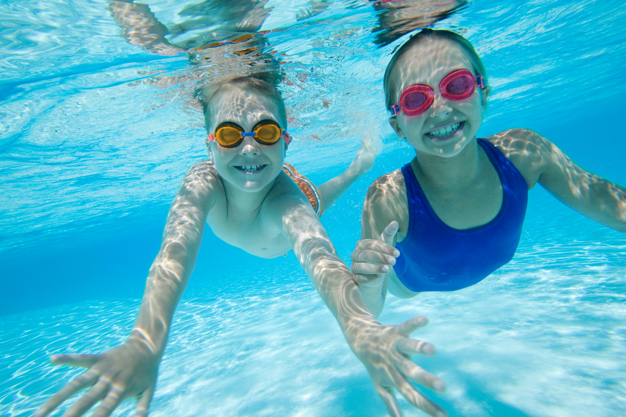Children swimming underwater